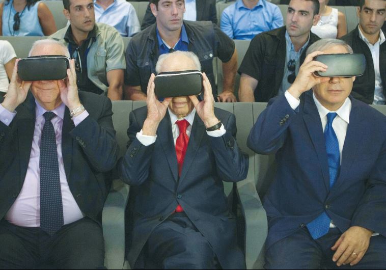 PRESIDENT REUVEN RIVLIN, former president Shimon Peres, and Prime Minister Benjamin Netanyahu don virtual reality goggles at the Peres Center for Peace and Innovation in Jaffa