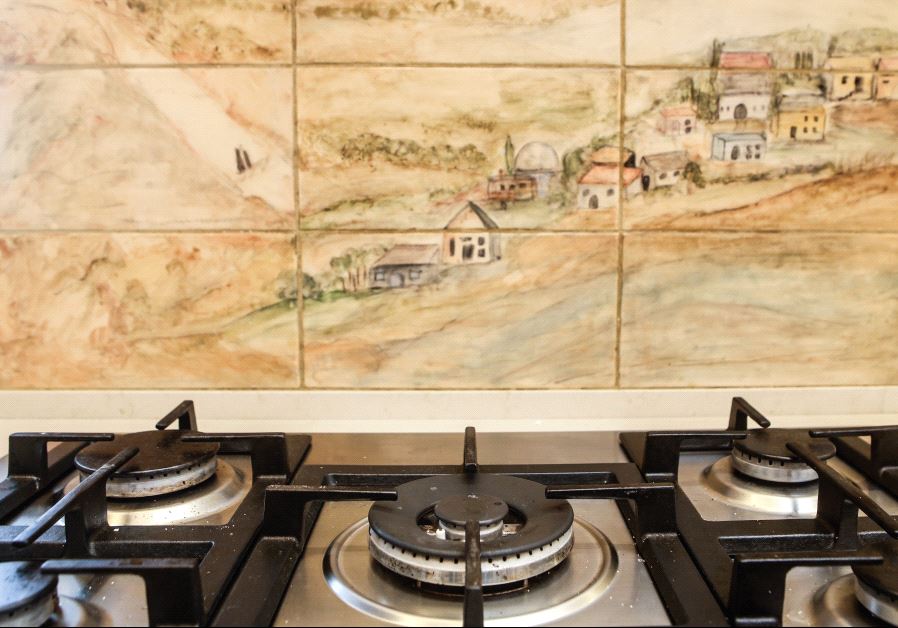 Backsplash tile murals find a natural home in the kitchen. Credit: MARC ISRAEL SELLEM