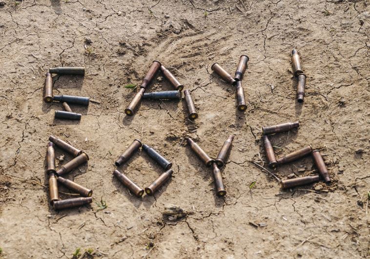 ‘CHAI BOYS’ in Kurdish, written out in bullets in a photo taken by ‘Ariel’ on his phone. (Courtesy Robert Amos)