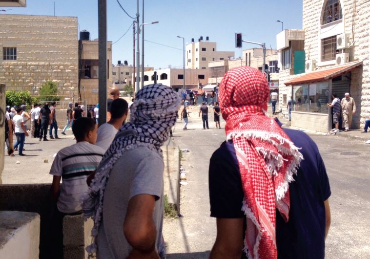 Rock-throwing in east Jerusalem in July 2014. (Seth J. Frantzman)