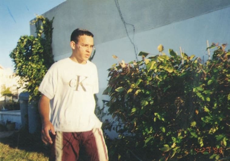 Shlomi Bashan as a child in the settlement of Atzmona and (right) as a teenager near his family’s home.