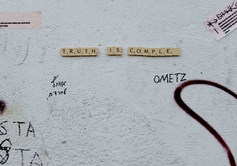 Ometz invites the public to be part of their graffiti by completing the sentence