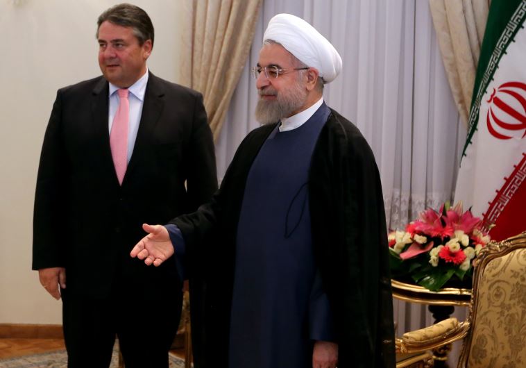 Germany vice chancellor and economic affairs minister Sigmar Gabriel with Iran president Hassan Rouhani. Credit: Atta Kenare/AFP