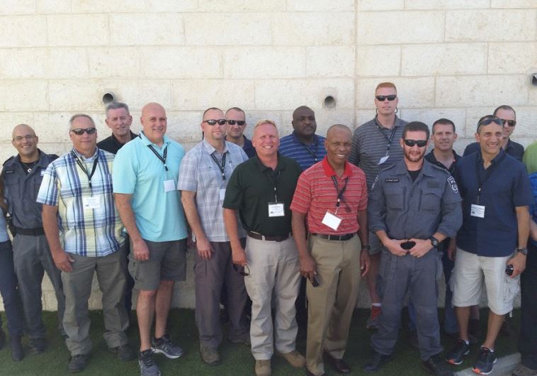 THE ADL delegation of senior US law enforcement officials poses with Israel Police officers in Jerusalem.
