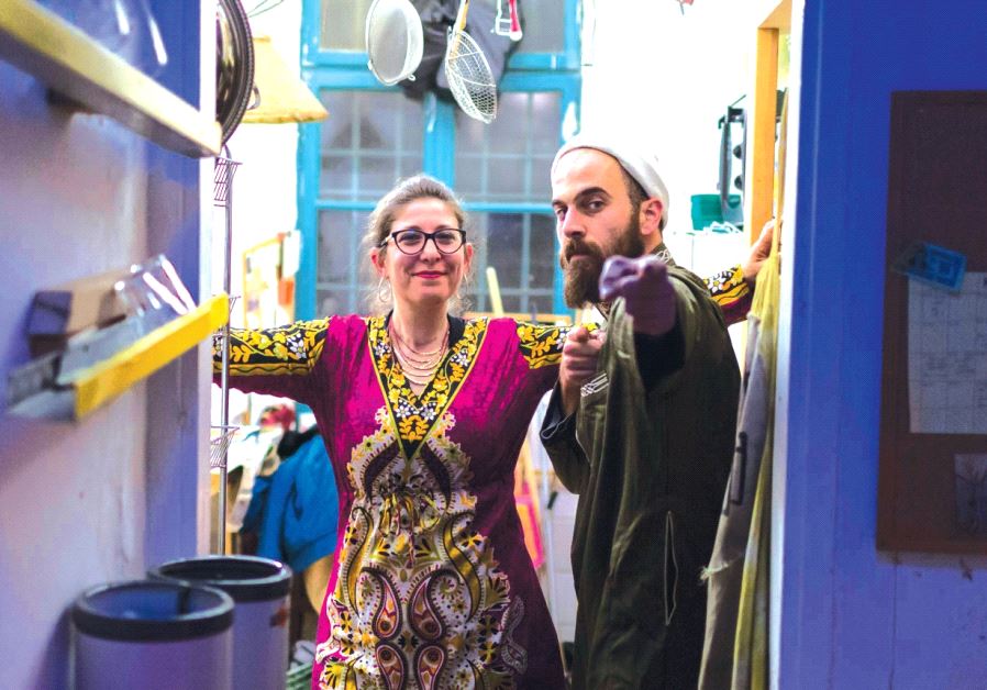 Efrat Ben-Tzur (left) and Chef Sellouk pause during service at the event. (Credit: Tomer Zmora)