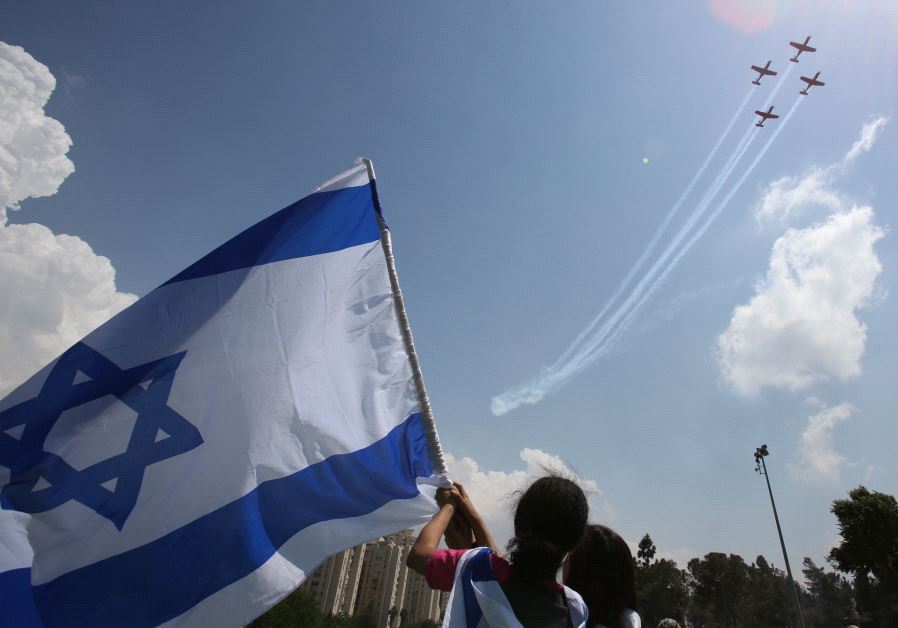 Israelis gather to watch the annual Independence Day flyover. 