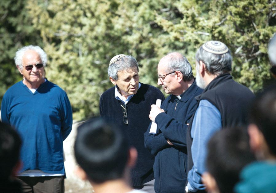  Gadi Gvaryahu (center left) in a Tag Meir activity at Beit Jamal Monastery. Credit: Yossi Zamir